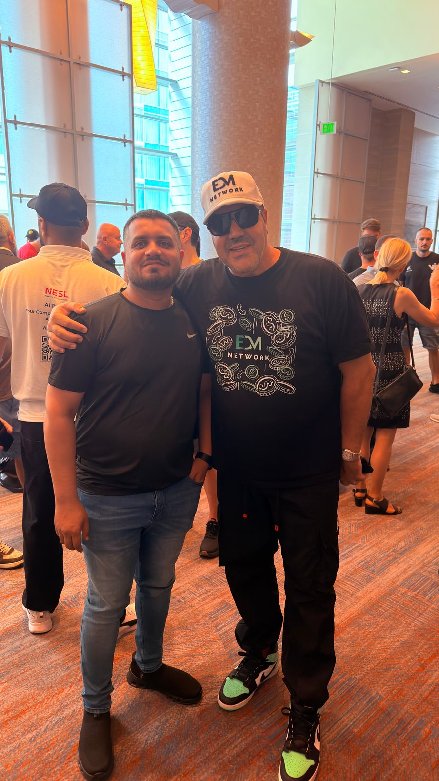 Wali Zuberi with an attendee on the Contact.io 2026 market floor in Denver, Colorado
