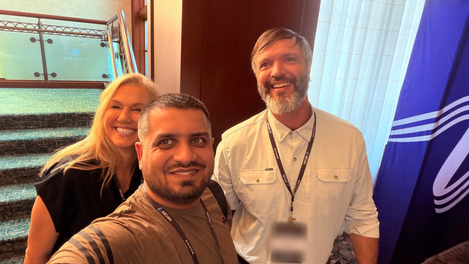 Group selfie of Wali Zuberi with two attendees at MedicareCon 2026 at Ross Bridge Resort